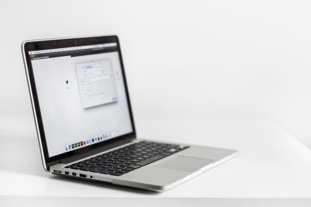 person reviewing a document on a laptop — Photo by NordWood Themes on Unsplash. Source: https://unsplash.com/photos/macbook-pro-_sg8nXmpWDM