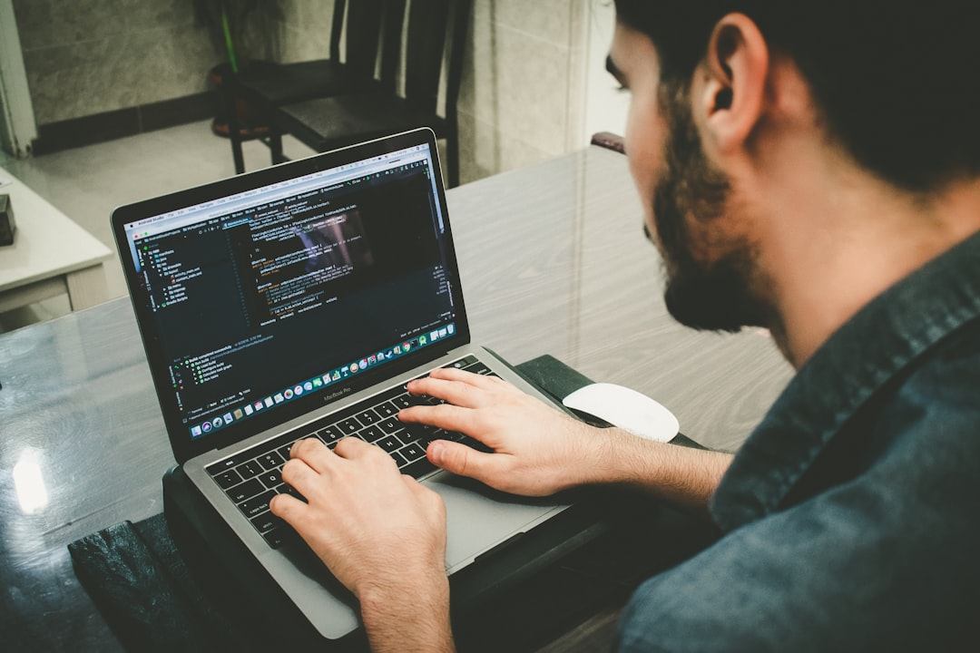 developer working with code on laptop — Photo by Danial Igdery on Unsplash. Source: https://unsplash.com/photos/man-programming-using-laptop-FCHlYvR5gJI